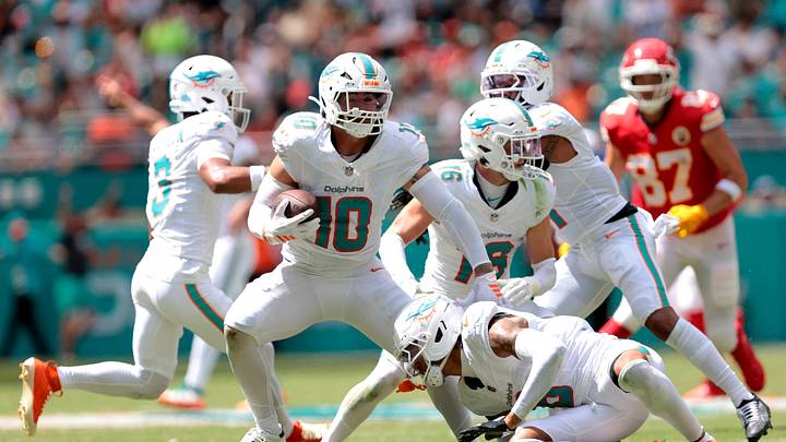 Sep 27, 2026; Miami Gardens, Florida, USA;  Miami Dolphins linebacker Jacob Rodriguez (10) with the ball after making an interception against the Kansas City Chiefs during the second quarter at Hard Rock Stadium.  Mandatory Credit: Sam Navarro-Imagn Images