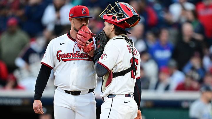 Oct 18, 2026: Cleveland Guardians pitcher Shawn Armstrong (43) talks with  catcher Patrick Bailey (16) in game five of the ALCS for the 2026 MLB Playoffs at Progressive Field. Credit: David Dermer-Imagn Images
