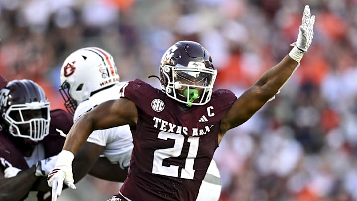 Sep 27, 2025; College Station, Texas, USA; Texas A&M Aggies linebacker Taurean York (21) defends in coverage against the Auburn Tigers during the fourth quarter at Kyle Field. Mandatory Credit: Maria Lysaker-Imagn Images 