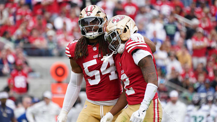 Nov 17, 2024; Santa Clara, California, USA; San Francisco 49ers linebacker Fred Warner (54) calms down San Francisco 49ers cornerback Deommodore Lenoir (2) after offsetting penalties against the Seattle Seahawks in the second quarter at Levi's Stadium. Mandatory Credit: David Gonzales-Imagn Images