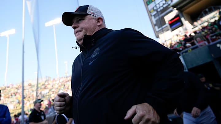 Oct 12, 2024; Eugene, Oregon, USA; Ohio State Buckeyes offensive coordinator Chip Kelly takes the field prior to the NCAA football game between the Ohio State Buckeyes and the Oregon Ducks at Autzen Stadium