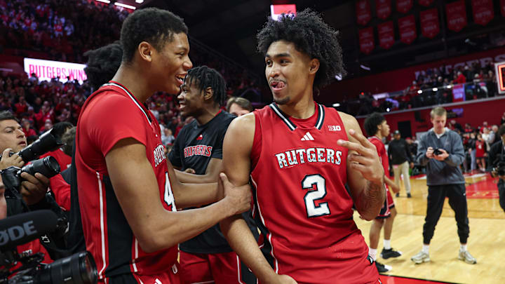 Dec 14, 2024; Piscataway, New Jersey, USA; Rutgers Scarlet Knights guard Dylan Harper (2) and guard Ace Bailey (4) celebrate after defeating the Seton Hall Pirates at Jersey Mike's Arena. Mandatory Credit: Vincent Carchietta-Imagn Images