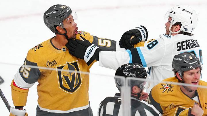 Apr 19, 2026; Las Vegas, Nevada, USA; Vegas Golden Knights right wing Keegan Kolesar (55) grabs the jersey of Utah Mammoth defenseman Mikhail Sergachev (98) at the end of game one of the first round of the 2026 Stanley Cup Playoffs at T-Mobile Arena. Mandatory Credit: Stephen R. Sylvanie-Imagn Images