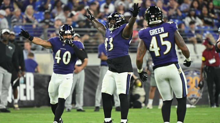Aug 7, 2025; Baltimore, Maryland, USA; Baltimore Ravens defensive tackle Aeneas Peebles (93) celebrates after batting down a pass at the line of scrimmage against the Indianapolis Colts during the third quarter at M&T Bank Stadium. Mandatory Credit: Rafael Suanes-Imagn Images Aug 7, 2025; Baltimore, Maryland, USA; Baltimore Ravens defensive tackle Aeneas Peebles (93) celebrates after batting down a pass at the line of scrimmage against the Indianapolis Colts during the third quarter at M&T Bank Stadium. Mandatory Credit: Rafael Suanes-Imagn Images