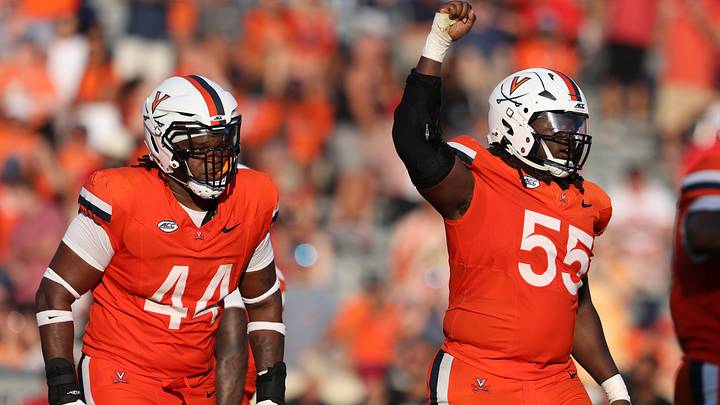 Aug 29, 2026; Charlottesville, Virginia, USA; Virginia Cavaliers defensive tackle Anthony Britton (55) celebrates a defensive stop during the game against the North Carolina State Wolfpack at Scott Stadium. Mandatory Credit: Greg Atkins-Imagn Images Aug 29, 2026; Charlottesville, Virginia, USA; Virginia Cavaliers defensive tackle Anthony Britton (55) celebrates a defensive stop during the game against the North Carolina State Wolfpack at Scott Stadium. Mandatory Credit: Greg Atkins-Imagn Images