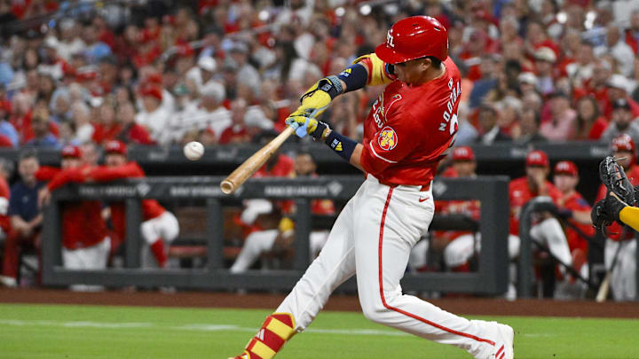 Sep 19, 2025; St. Louis, Missouri, USA;  St. Louis Cardinals left fielder Lars Nootbaar (21) hits a one run single against the Milwaukee Brewers during the first inning at Busch Stadium. Mandatory Credit: Jeff Curry-Imagn Images