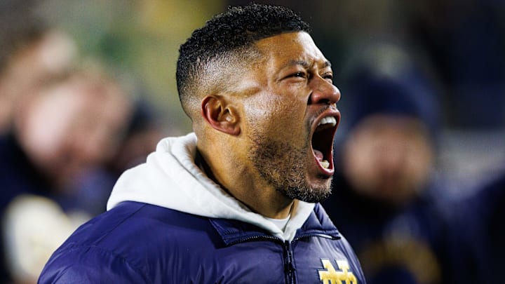 Notre Dame head coach Marcus Freeman celebrates after winning the first round of the College Football Playoff 27-17 against Indiana at Notre Dame Stadium on Friday, Dec. 20, 2024, in South Bend.