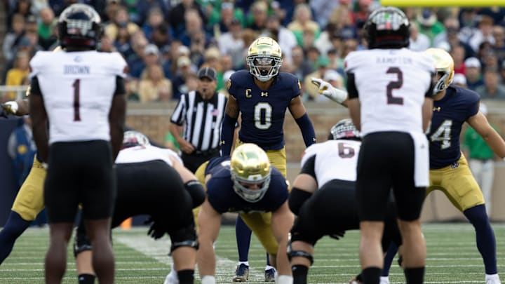 Notre Dame safety Xavier Watts (0) waits for the snao during a NCAA college football game between Notre Dame and Northern Illinois at Notre Dame Stadium on Saturday, Sept. 7, 2024, in South Bend.