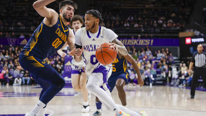 Feb 17, 2024; Seattle, Washington, USA; Washington Huskies guard Koren Johnson (0) dribbles against Feb 17, 2024; Seattle, Washington, USA; Washington Huskies guard Koren Johnson (0) dribbles against