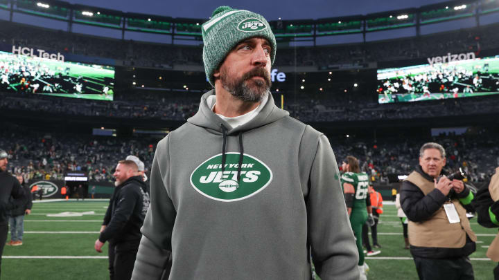 Dec 24, 2023; East Rutherford, New Jersey, USA; New York Jets quarterback Aaron Rodgers (8) on the field after the game against the Washington Commanders at MetLife Stadium.