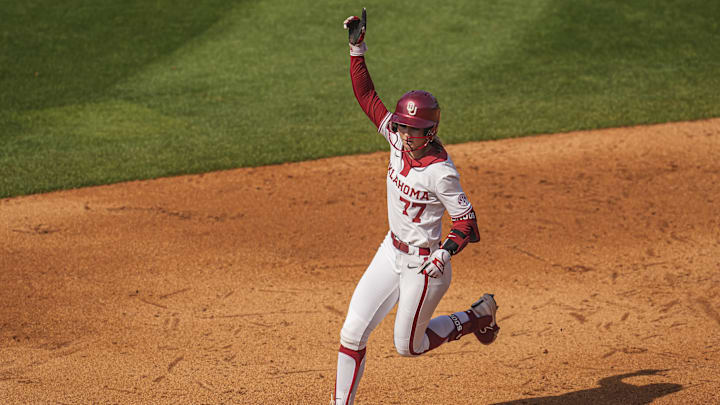 Oklahoma's Sydney Barker reacts after hitting a home run against Arkansas at Jack Turner Softball Stadium. Oklahoma's Sydney Barker reacts after hitting a home run against Arkansas at Jack Turner Softball Stadium.
