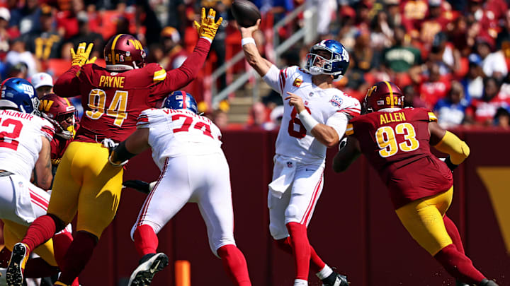 Sep 15, 2024; Landover, Maryland, USA; New York Giants quarterback Daniel Jones (8) throws a pass against the Washington Commanders during the second quarter at Commanders Field.  