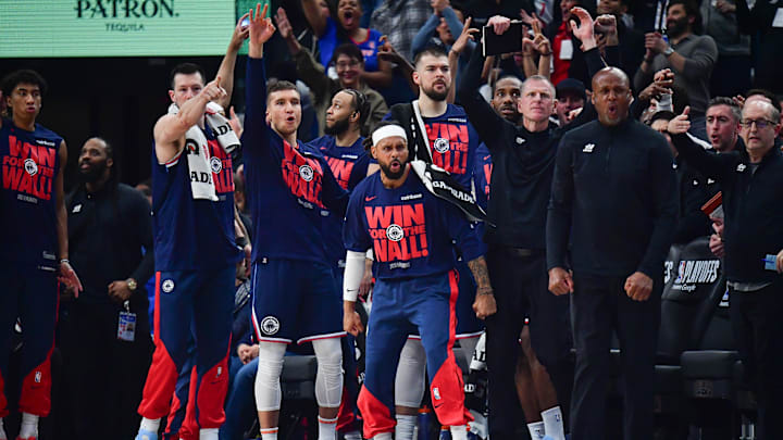 Apr 24, 2025; Inglewood, California, USA; Los Angeles Clippers guard Patty Mills (88) and the bench react against the Denver Nuggets during the first half of game three in the first round for the 2024 NBA Playoffs at Intuit Dome. Mandatory Credit: Gary A. Vasquez-Imagn Images