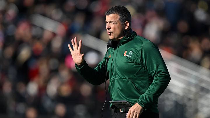 Nov 24, 2023; Chestnut Hill, Massachusetts, USA; Miami Hurricanes head coach Mario Cristobal calls a play against the Boston College Eagles during the first half at Alumni Stadium. Mandatory Credit: Brian Fluharty-USA TODAY Sports