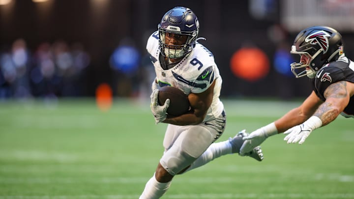Oct 20, 2024; Atlanta, Georgia, USA; Seattle Seahawks running back Kenneth Walker III (9) runs the ball against the Atlanta Falcons in the first quarter at Mercedes-Benz Stadium. Mandatory Credit: Brett Davis-Imagn Images