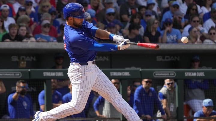 Mar 3, 2024; Mesa, Arizona, USA; Chicago Cubs Joe Hudson (57) hits a single against the Cleveland Mar 3, 2024; Mesa, Arizona, USA; Chicago Cubs Joe Hudson (57) hits a single against the Cleveland