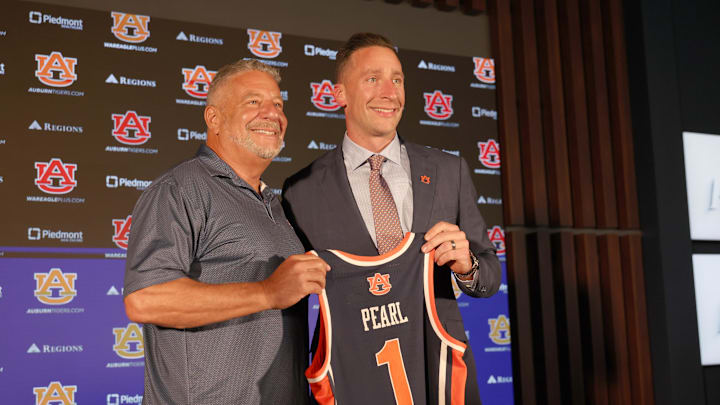 Sep 24, 2025; Auburn, AL, USA;  Auburn Tigers head basketball coach Steven Pearl and his father, former head coach Bruce Pearl, at his introductory news conference on Wednesday.  Mandatory Credit: John Reed-Imagn Images