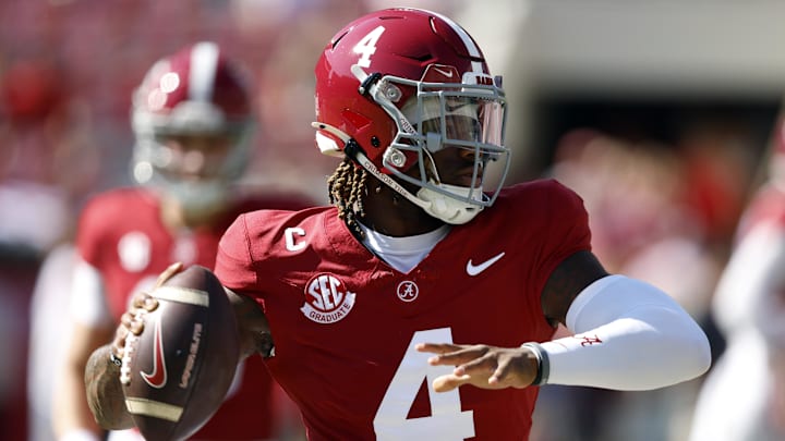 Oct 26, 2024; Tuscaloosa, Alabama, USA;  Alabama Crimson Tide quarterback Jalen Milroe (4) warms up before a game against the Missouri Tigers at Bryant-Denny Stadium. Mandatory Credit: Butch Dill-Imagn Images