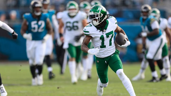 New York Jets wide receiver Davante Adams (17) rushes for yards during the third quarter Sunday, Dec. 15, 2024 at EverBank Stadium in Jacksonville, Fla. The Jets held off the Jaguars 32-25. [Corey Perrine/Florida Times-Union]