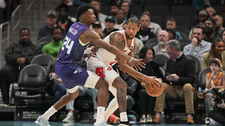 Dec 12, 2025; Charlotte, North Carolina, USA; Chicago Bulls forward Dalen Terry (7) handles the ball defended by Charlotte Hornets forward Brandon Miller (24) during the first quarter at Spectrum Center. Mandatory Credit: Jim Dedmon-Imagn Images Dec 12, 2025; Charlotte, North Carolina, USA; Chicago Bulls forward Dalen Terry (7) handles the ball defended by Charlotte Hornets forward Brandon Miller (24) during the first quarter at Spectrum Center. Mandatory Credit: Jim Dedmon-Imagn Images