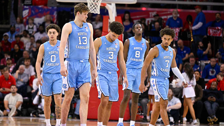 Jan 3, 2026; Dallas, Texas, USA; North Carolina Tar Heels guard Kyan Evans (0) and center Henri Veesaar (13) and guard Derek Dixon (3) and forward Caleb Wilson (8) and guard Seth Trimble (7) come back on the court during the second half against the SMU Mustangs at Moody Coliseum. Mandatory Credit: Jerome Miron-Imagn Images