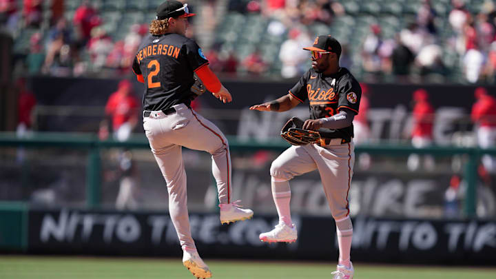 May 11, 2025; Anaheim, California, USA; Baltimore Orioles shortstop Gunnar Henderson (2) and center fielder Cedric Mullins (31) celebrate after the game against the Los Angeles Angels  at Angel Stadium. Mandatory Credit: Kirby Lee-Imagn Images