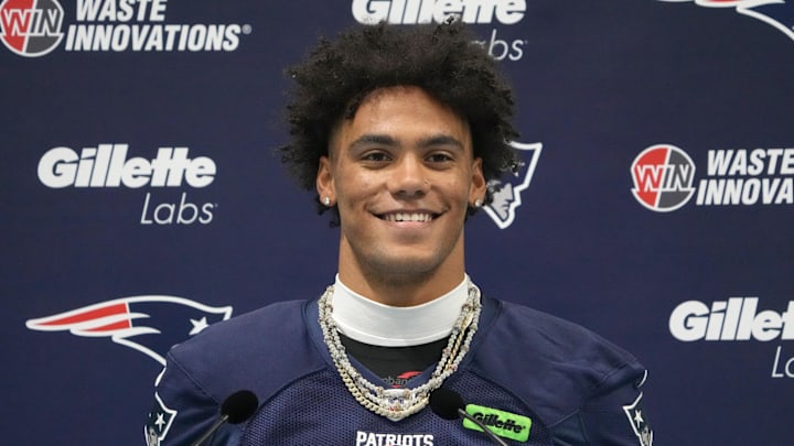 Oct 18, 2024; London, United Kingdom; New England Patriots cornerback Christian Gonzalez (0) at press conference at the Harrow School. Mandatory Credit: Kirby Lee-Imagn Images Oct 18, 2024; London, United Kingdom; New England Patriots cornerback Christian Gonzalez (0) at press conference at the Harrow School. Mandatory Credit: Kirby Lee-Imagn Images