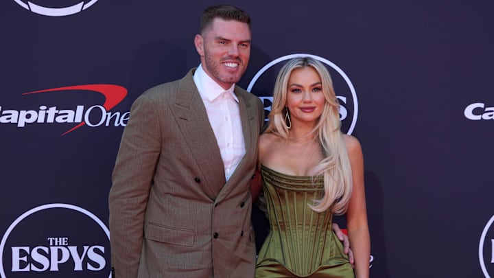 Los Angeles Dodgers first baseman Freddie Freeman (left) and wife Chelsea Freeman pose on the ESPYs red carpet at the Dolby Theatre.