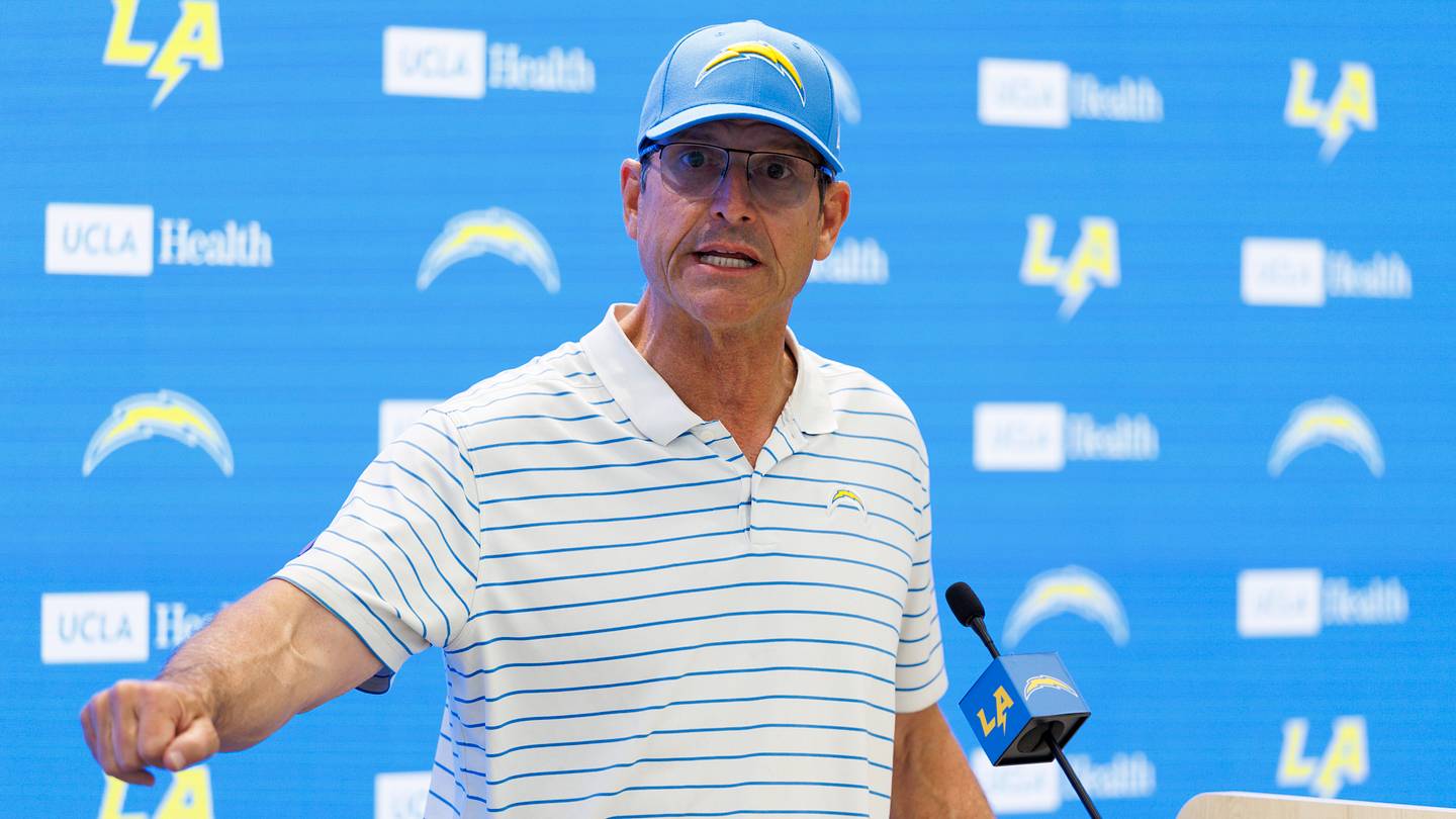 Harbaugh's Merit Patches Spark Debate Over Team Focus