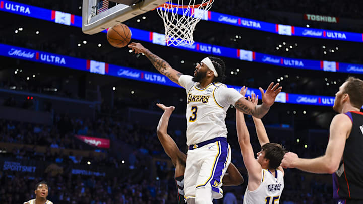Nov 10, 2024; Los Angeles, California, USA; Los Angeles Lakers forward Anthony Davis (3) blocks the ball from against the Toronto Raptors during the second half at Crypto.com Arena. Mandatory Credit: Jonathan Hui-Imagn Images Nov 10, 2024; Los Angeles, California, USA; Los Angeles Lakers forward Anthony Davis (3) blocks the ball from against the Toronto Raptors during the second half at Crypto.com Arena. Mandatory Credit: Jonathan Hui-Imagn Images