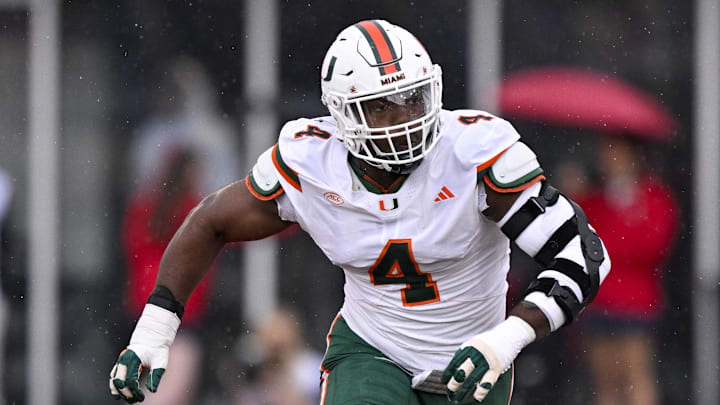 Nov 1, 2025; Dallas, Texas, USA; Miami Hurricanes defensive lineman Rueben Bain Jr. (4) rushes the line during the game between the Mustangs and the Hurricanes at Gerald J. Ford Stadium. Mandatory Credit: Jerome Miron-Imagn Images Nov 1, 2025; Dallas, Texas, USA; Miami Hurricanes defensive lineman Rueben Bain Jr. (4) rushes the line during the game between the Mustangs and the Hurricanes at Gerald J. Ford Stadium. Mandatory Credit: Jerome Miron-Imagn Images