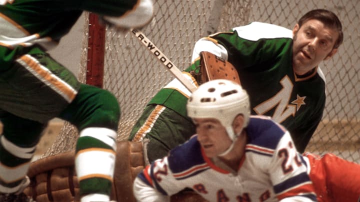 Dec 1971; New York, NY, USA; FILE PHOTO; Minnesota Northstars goalie Lorne Gump Worsley (1) in action during a 1971 game against the New York Rangers. Worsley played 21 seasons in the NHL after making his debut in 1952 and played on four Stanley Cup championship teams. Mandatory Credit: Manny Rubio-Imagn Images