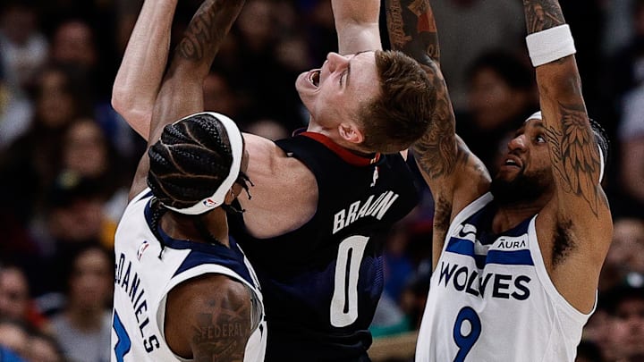 May 6, 2024; Denver, Colorado, USA; Denver Nuggets guard Christian Braun (0) attempts a shot as