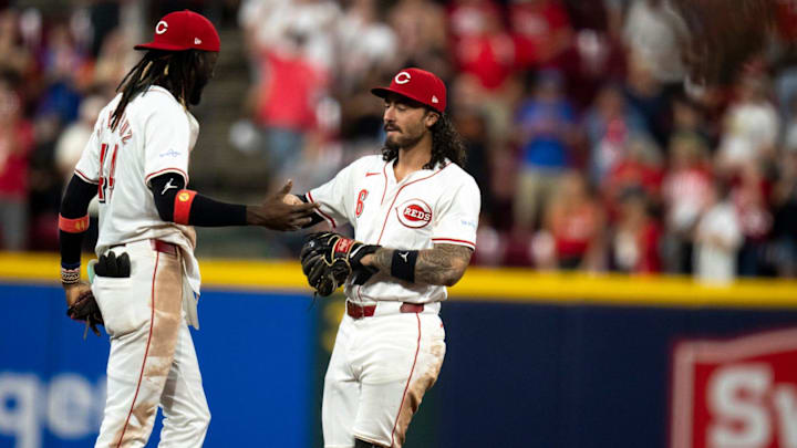 Aug 3, 2024; Cincinnati, Ohio, USA; Cincinnati Reds shortstop Elly De La Cruz (44) and second baseman Jonathan India (6) celebrate after defeating the San Francisco Giants at Great American Ball Park. Aug 3, 2024; Cincinnati, Ohio, USA; Cincinnati Reds shortstop Elly De La Cruz (44) and second baseman Jonathan India (6) celebrate after defeating the San Francisco Giants at Great American Ball Park.
