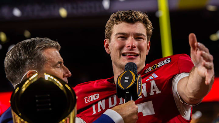Indiana's Fernando Mendoza (15) talks to the crowd on the podium after the College Football Playoff National Championship college football game at Hard Rock Stadium in Miami Gardens on Monday, Jan. 19, 2026.
