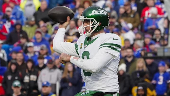 Dec 29, 2024; Orchard Park, New York, USA; New York Jets quarterback Aaron Rodgers (8) throws the ball against the Buffalo Bills during the second half at Highmark Stadium. Mandatory Credit: Gregory Fisher-Imagn Images