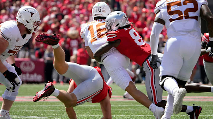 Ohio State Buckeyes linebacker Arvell Reese (8) tackles Texas Longhorns quarterback Arch Manning (16) on a run in the first quarter of their game at Ohio Stadium in Columbus, Ohio on Aug 30, 2025. Ohio State Buckeyes linebacker Arvell Reese (8) tackles Texas Longhorns quarterback Arch Manning (16) on a run in the first quarter of their game at Ohio Stadium in Columbus, Ohio on Aug 30, 2025.