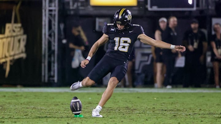 Sep 6, 2025; Orlando, Florida, USA; UCF Knights place kicker Noe Ruelas (16) kicks off during the second quarter against the North Carolina A&T Aggies at Acrisure Bounce House. Mandatory Credit: Mike Watters-Imagn Images Sep 6, 2025; Orlando, Florida, USA; UCF Knights place kicker Noe Ruelas (16) kicks off during the second quarter against the North Carolina A&T Aggies at Acrisure Bounce House. Mandatory Credit: Mike Watters-Imagn Images