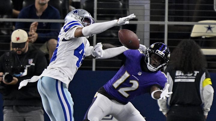Aug 16, 2025; Arlington, Texas, USA; Dallas Cowboys cornerback Zion Childress (48) breaks up a pass intended for Baltimore Ravens wide receiver Malik Cunningham (12) during the second half at AT&T Stadium. Mandatory Credit: Jerome Miron-Imagn Images