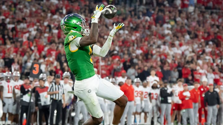 Oregon wide receiver Traeshon Holden catches a touchdown pass as the Oregon Ducks face the Ohio State Buckeyes. Oregon wide receiver Traeshon Holden catches a touchdown pass as the Oregon Ducks face the Ohio State Buckeyes.
