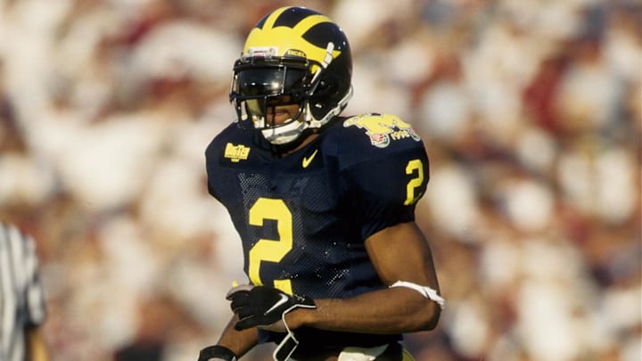 Jan 1, 1998; Pasadena, CA, USA: FILE PHOTO; Michigan Wolverines defensive back Charles Woodson (2) in action against the Washington State Cougars during the 1998 Rose Bowl.