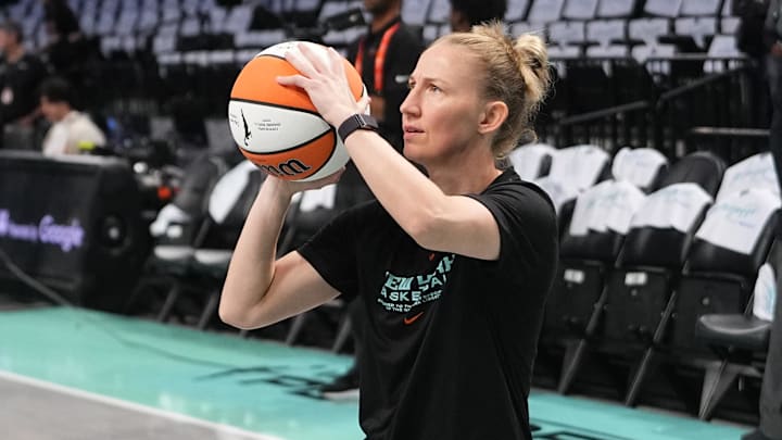 Sep 29, 2024; Brooklyn, New York, USA; New York Liberty guard Courtney Vandersloot (22) warms up prior to the game one of the 2024 WNBA Semi-finals against the Las Vegas Aces at Barclays Center. Mandatory Credit: Gregory Fisher-Imagn Images