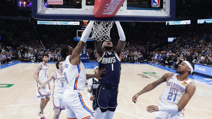Mar 14, 2024; Oklahoma City, Oklahoma, USA; Dallas Mavericks guard Jaden Hardy (1) goes up for a