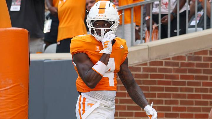 Sep 5, 2026; Knoxville, Tennessee, USA;  Tennessee Volunteers wide receiver Mike Matthews (4) celebrates a touchdown against the Furman Paladins during the second half at Neyland Stadium.  Mandatory Credit: Randy Sartin-Imagn Images