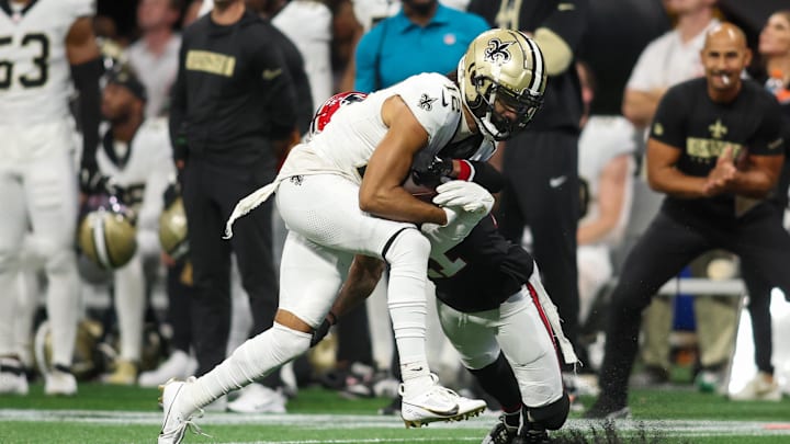 Sep 29, 2024; Atlanta, Georgia, USA; New Orleans Saints wide receiver Chris Olave (12) runs after a catch against the Atlanta Falcons in the fourth quarter at Mercedes-Benz Stadium. Mandatory Credit: Brett Davis-Imagn Images Sep 29, 2024; Atlanta, Georgia, USA; New Orleans Saints wide receiver Chris Olave (12) runs after a catch against the Atlanta Falcons in the fourth quarter at Mercedes-Benz Stadium. Mandatory Credit: Brett Davis-Imagn Images
