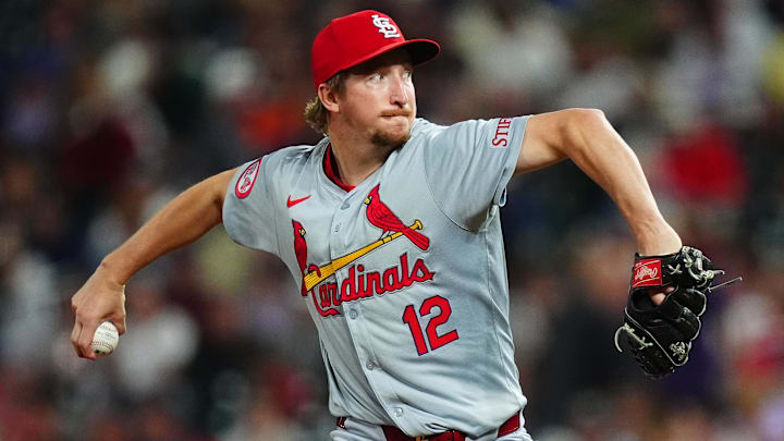 Sep 25, 2024; Denver, Colorado, USA; St. Louis Cardinals starting pitcher Erick Fedde (12) delivers a pitch in the eighth inning against the Colorado Rockies at Coors Field. Mandatory Credit: Ron Chenoy-Imagn Images