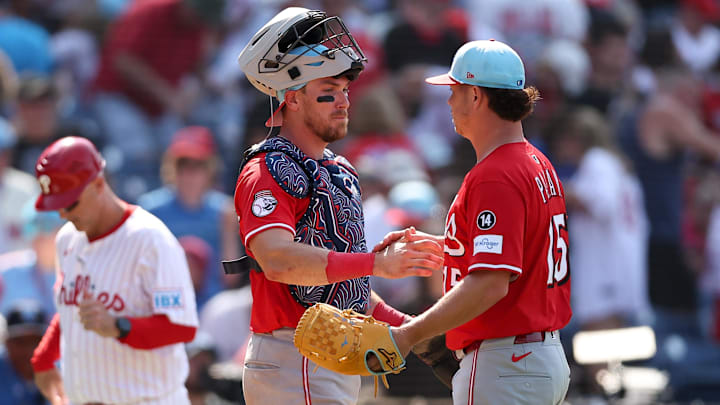 Jul 4, 2025; Philadelphia, Pennsylvania, USA; Cincinnati Reds catcher Tyler Stephenson (37) and pitcher Emilio Pagan (15) shake hands after a victory against the Philadelphia Phillies at Citizens Bank Park. Mandatory Credit: Bill Streicher-Imagn Images Jul 4, 2025; Philadelphia, Pennsylvania, USA; Cincinnati Reds catcher Tyler Stephenson (37) and pitcher Emilio Pagan (15) shake hands after a victory against the Philadelphia Phillies at Citizens Bank Park. Mandatory Credit: Bill Streicher-Imagn Images