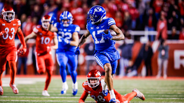 BYU wide receiver Keelan Marion returns a kickoff for a touchdown against Utah