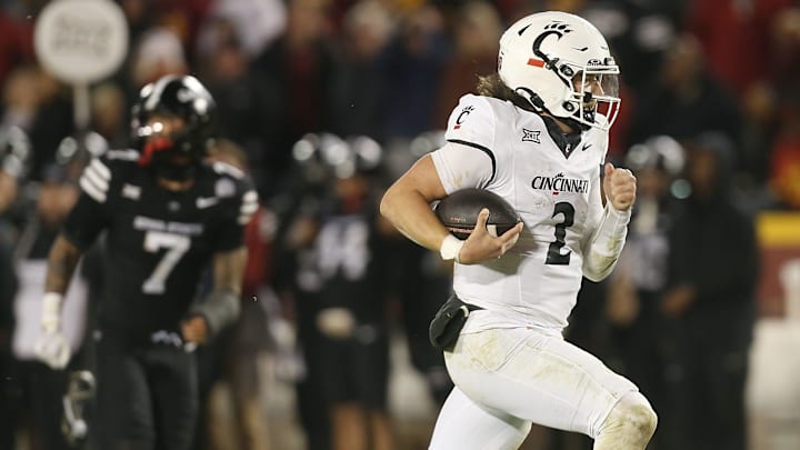 Cincinnati Bearcats' quarterback Brendan Sorsby (2) runs for a touchdown against Iowa State during the fourth quarter in the week-12 NCAA football at Jack Trice Stadium on Saturday, Nov. 16, 2024, in Ames, Iowa. Cincinnati Bearcats' quarterback Brendan Sorsby (2) runs for a touchdown against Iowa State during the fourth quarter in the week-12 NCAA football at Jack Trice Stadium on Saturday, Nov. 16, 2024, in Ames, Iowa.