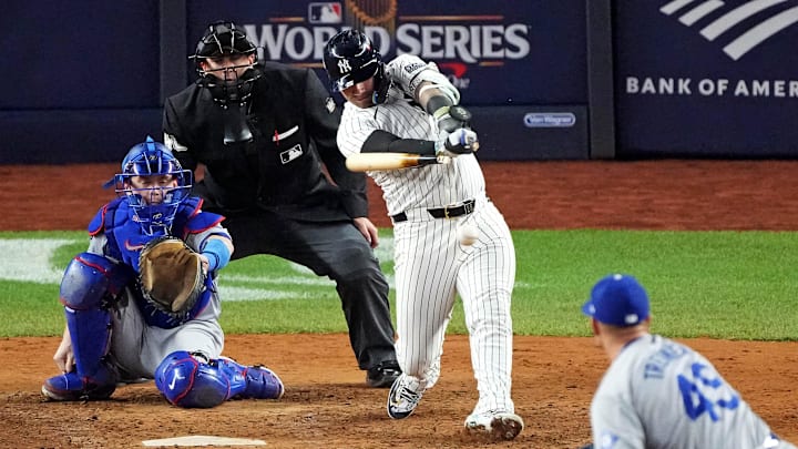 Oct 30, 2024; New York, New York, USA; New York Yankees second baseman Gleyber Torres (25) breaks his bat on a ground out during the seventh inning against the Los Angeles Dodgers in game four of the 2024 MLB World Series at Yankee Stadium.